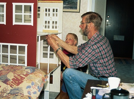 Grandpa and Erik assembling the parts.